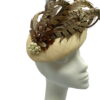Stunning feather headpiece with pearl bead detail to finish.